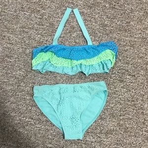 Ruffled blue green and turquoise bathing suit